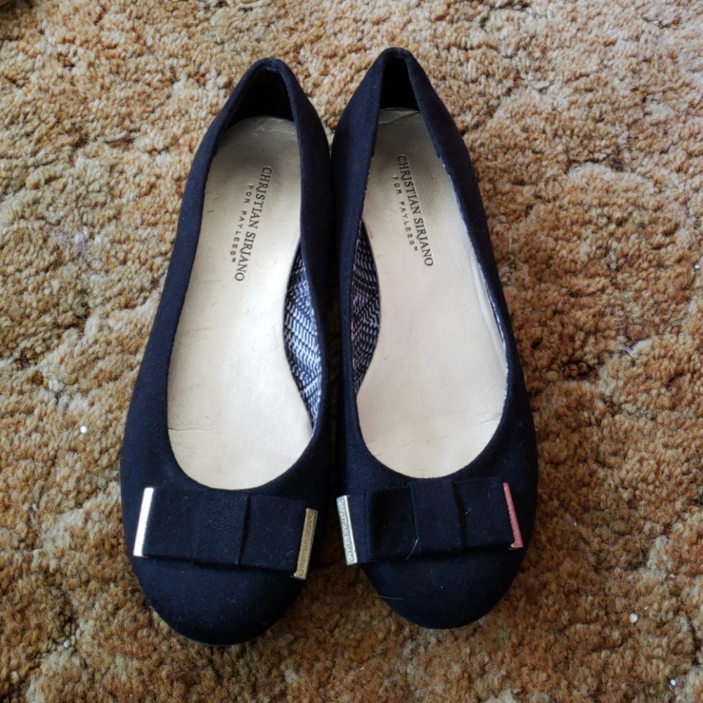 Black suede flats with gold trim
